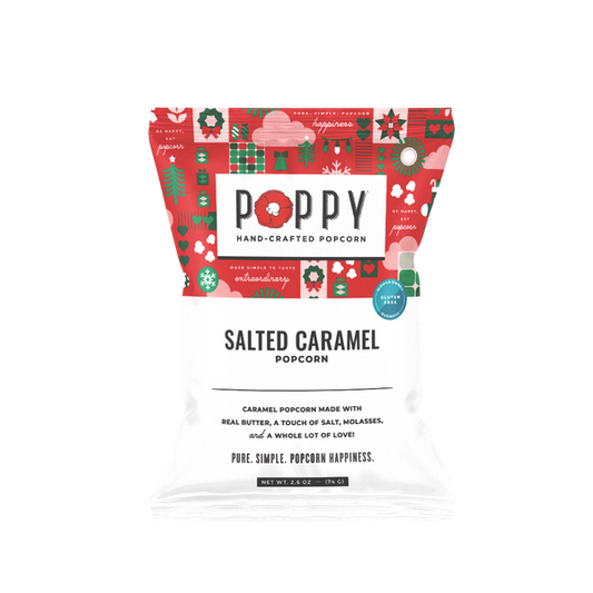 A bag of Poppy Hand-Crafted Popcorn in the Salted Caramel flavor, featuring a festive red and green holiday-themed header card on a white bag.